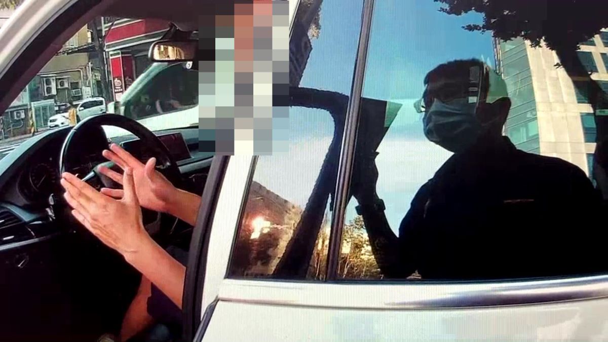 圖：員警上前詢問駕駛車輛狀況